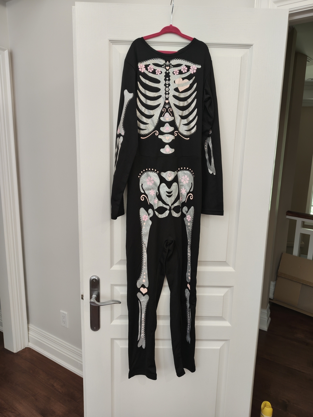 H&M Black Skeleton Jumpsuit with Pink Floral Accents